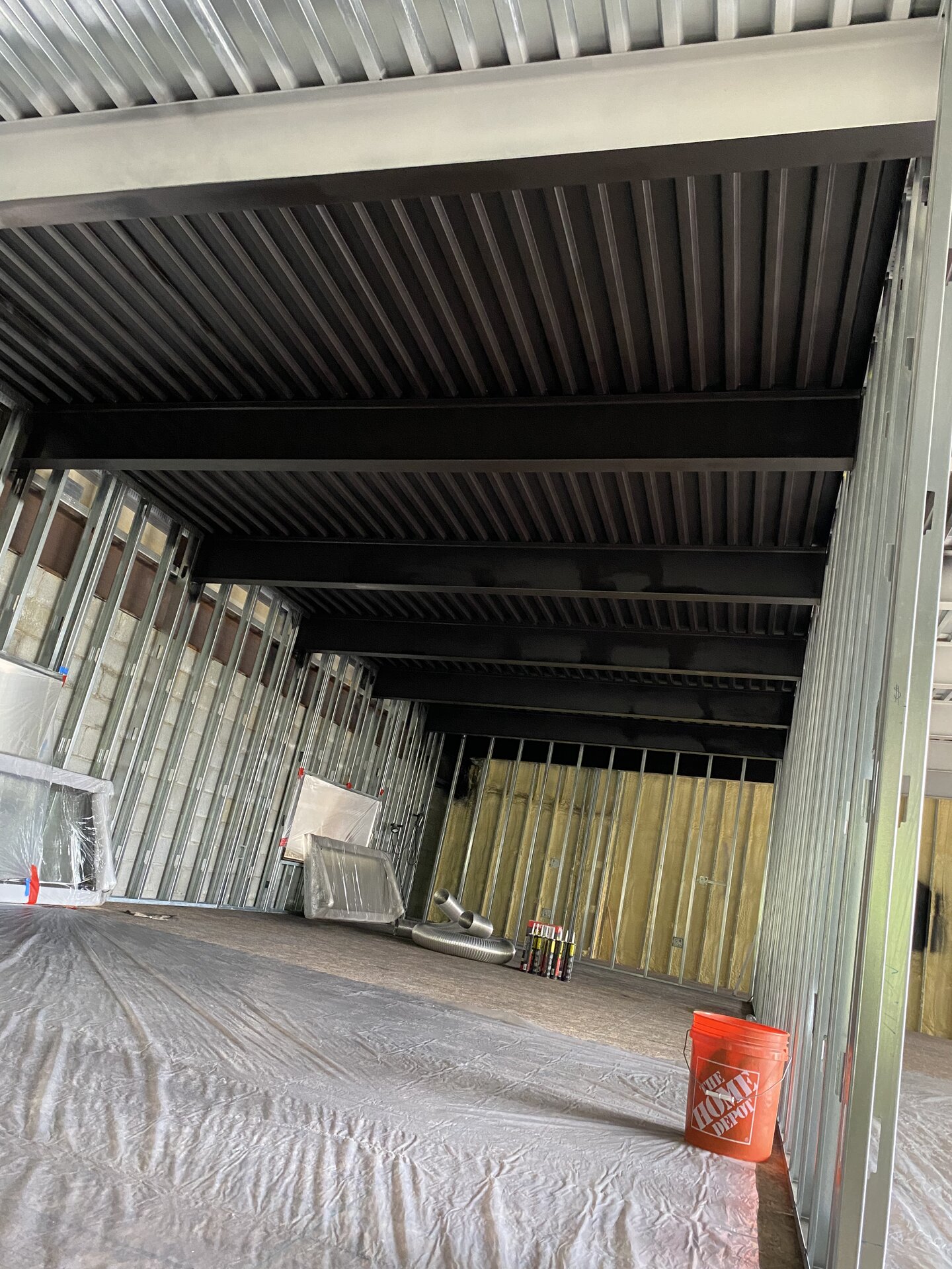 Interior steel ceiling after dark coating application