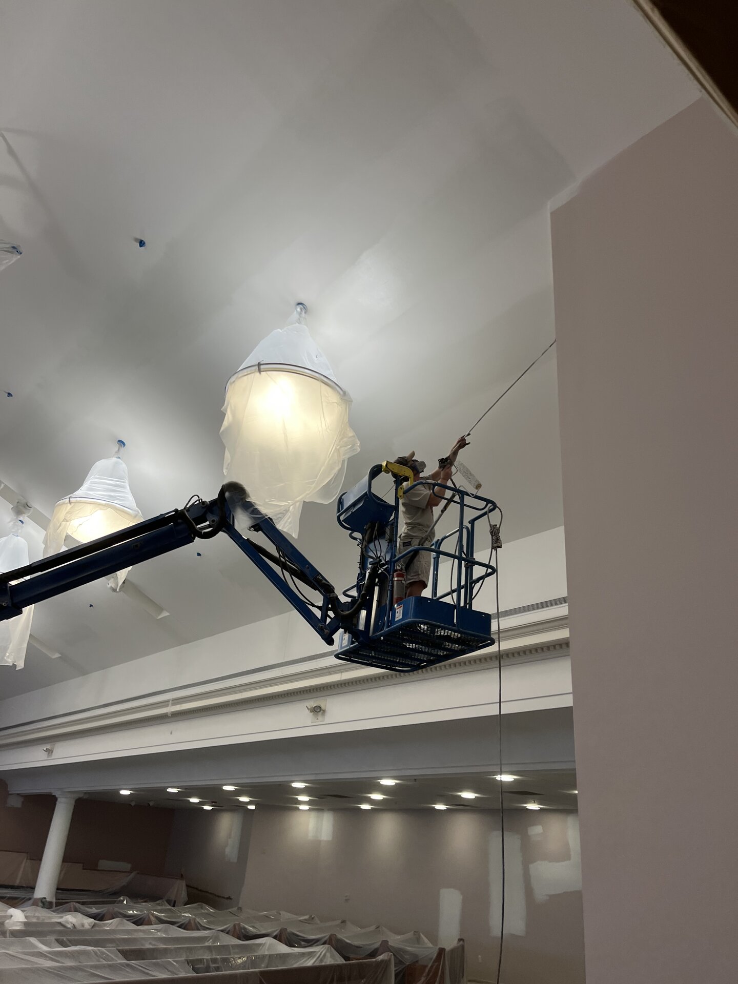 Interior painting — upper wall and trim work