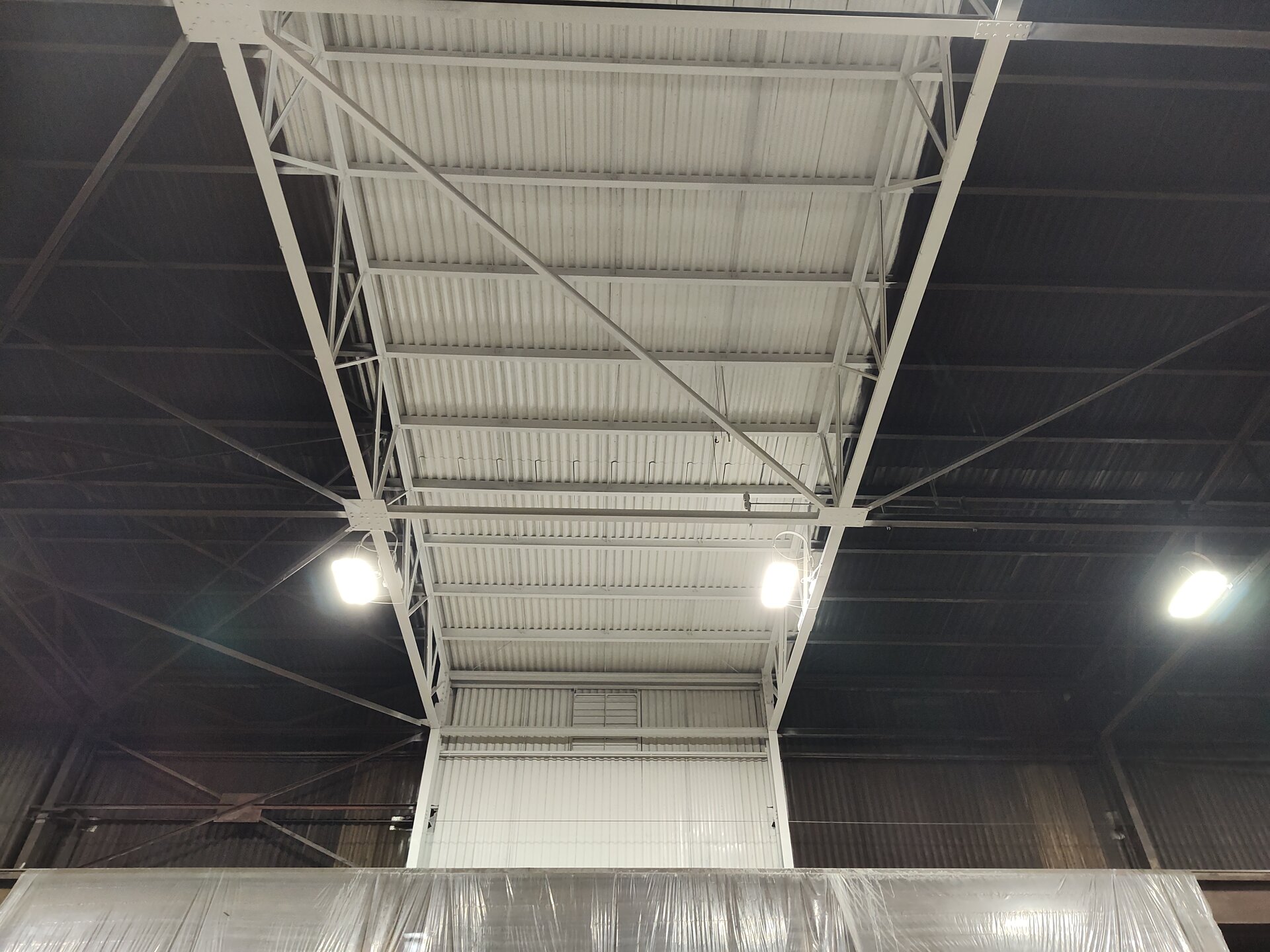 Painted roof decking and structural steel — showing the difference a fresh industrial coating makes