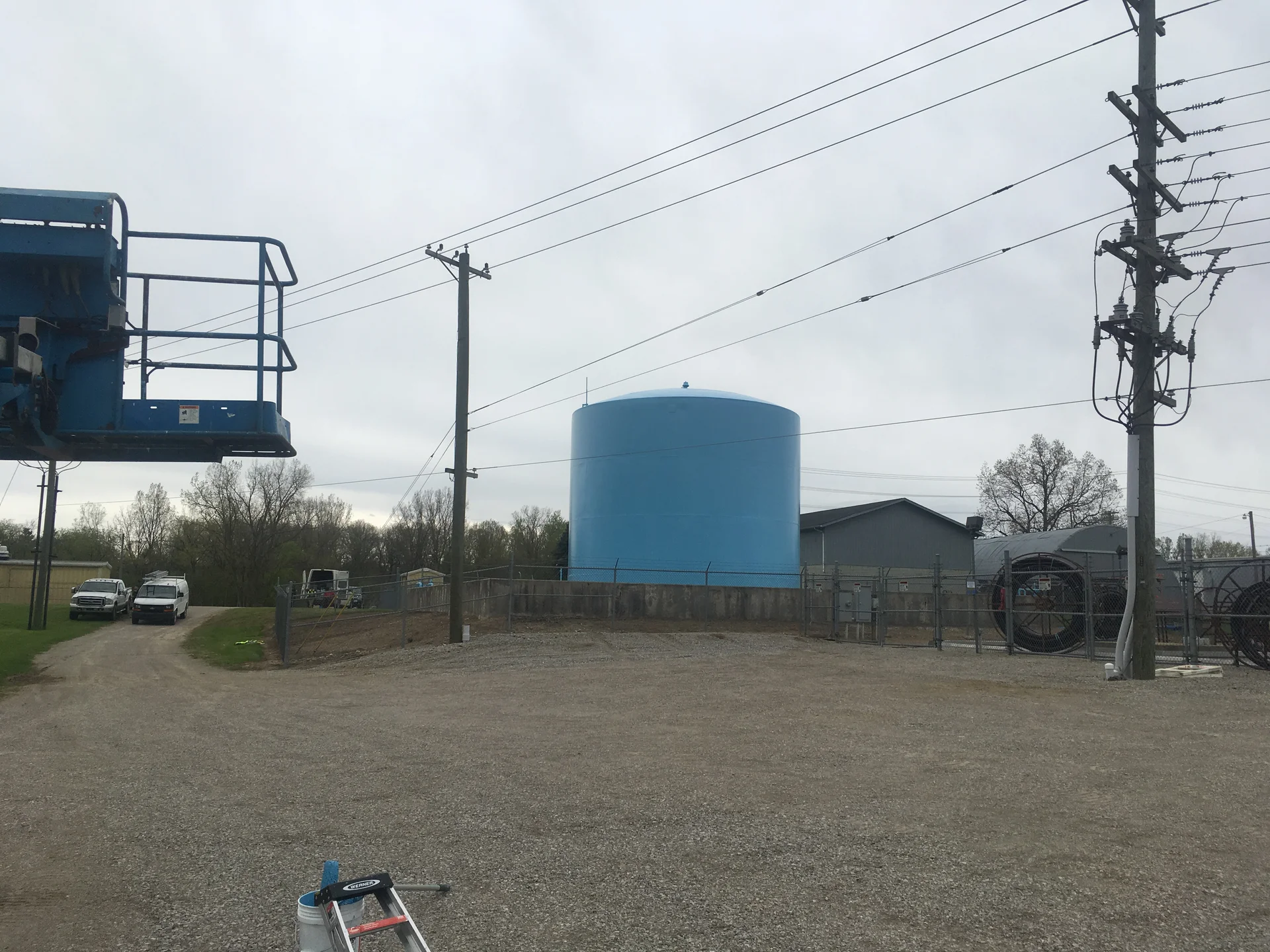 Freshly painted blue exterior tank at a wastewater facility in Hillsdale, Michigan