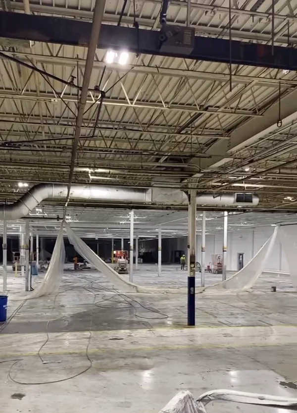 LuxWall facility ceiling, ductwork, and columns after cleaning and painting