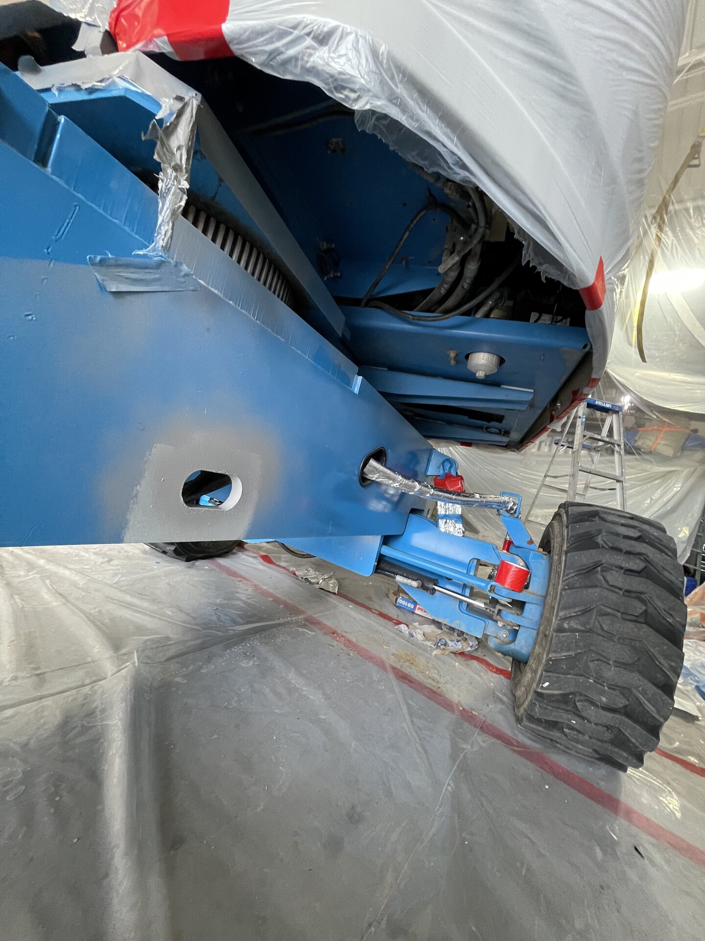 Lift chassis detail — rust treated, primed, and finish coated