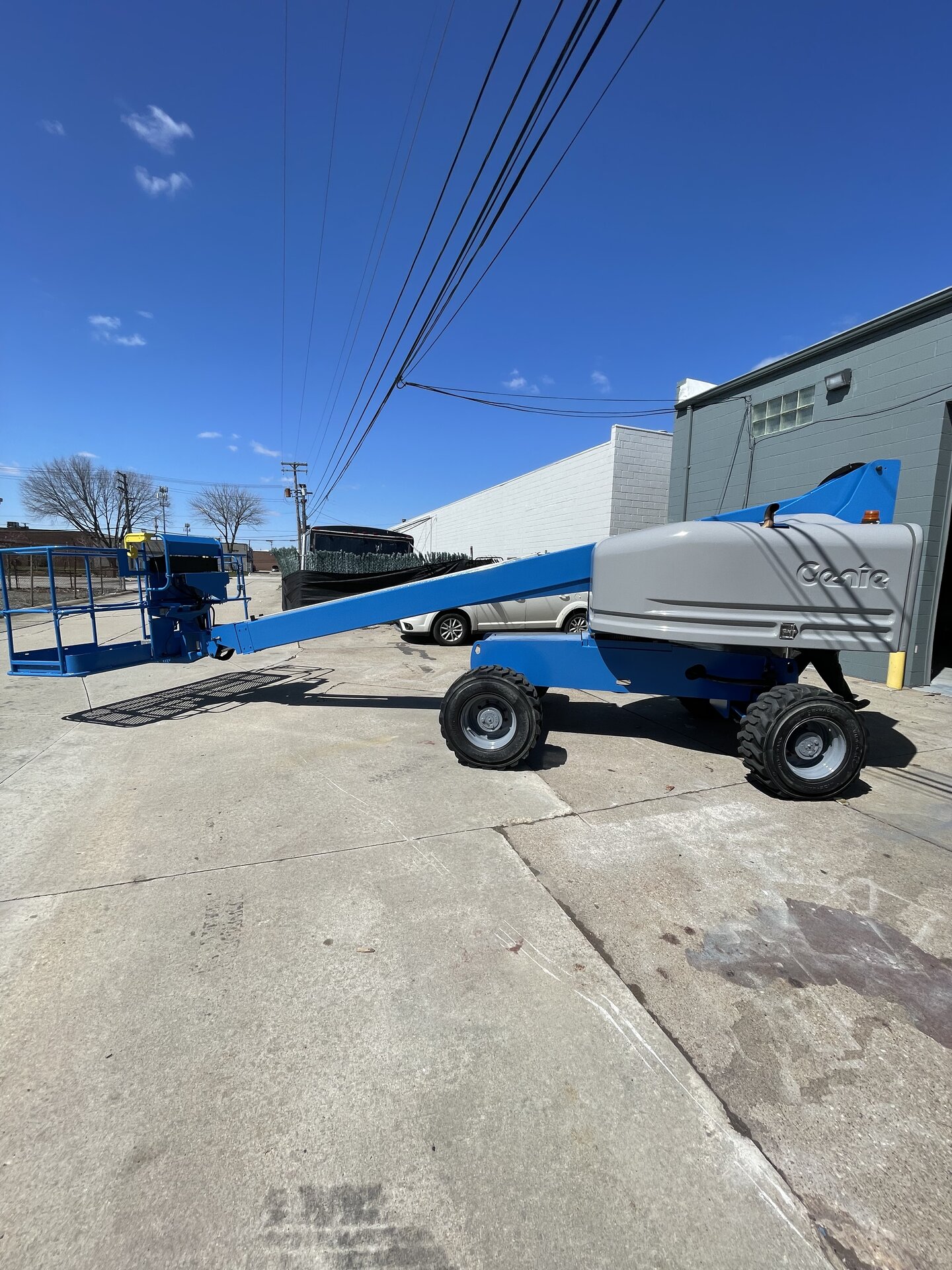 Equipment detail — control panel area masked, surrounding surfaces coated