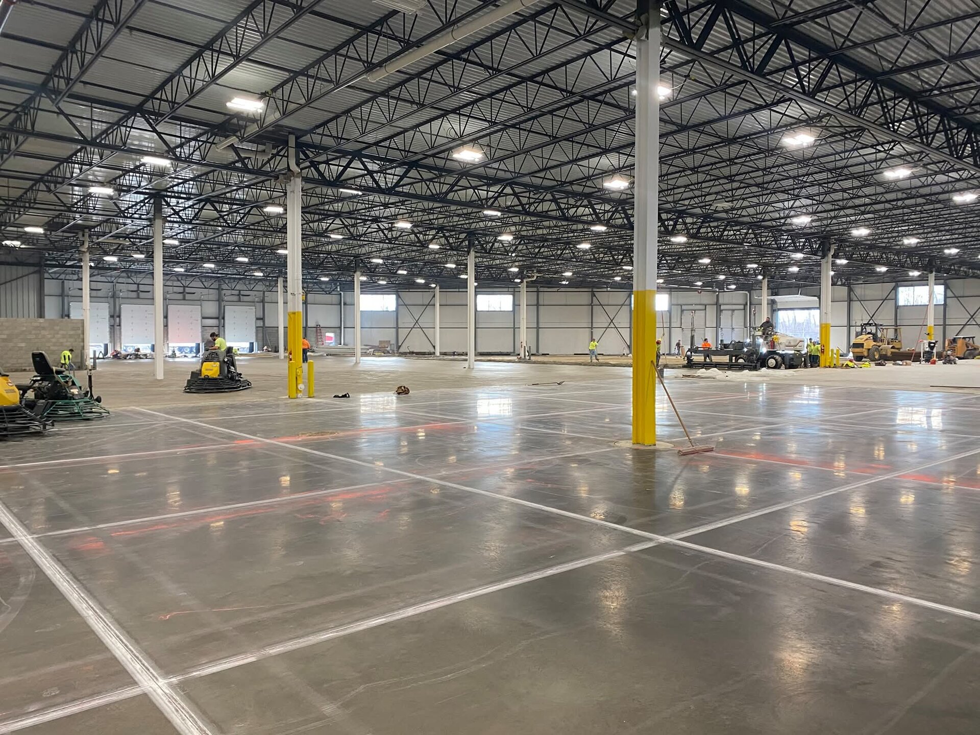 OSHA safety yellow column painting in new construction industrial facility